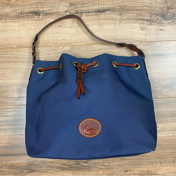 Dooney & Bourke Handbags - Dooney & Bourke Canvas Drawstring Bucket Bag Color Navy